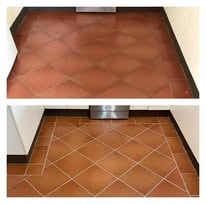 Kitchen floor tiles after — clean fresh grout lines